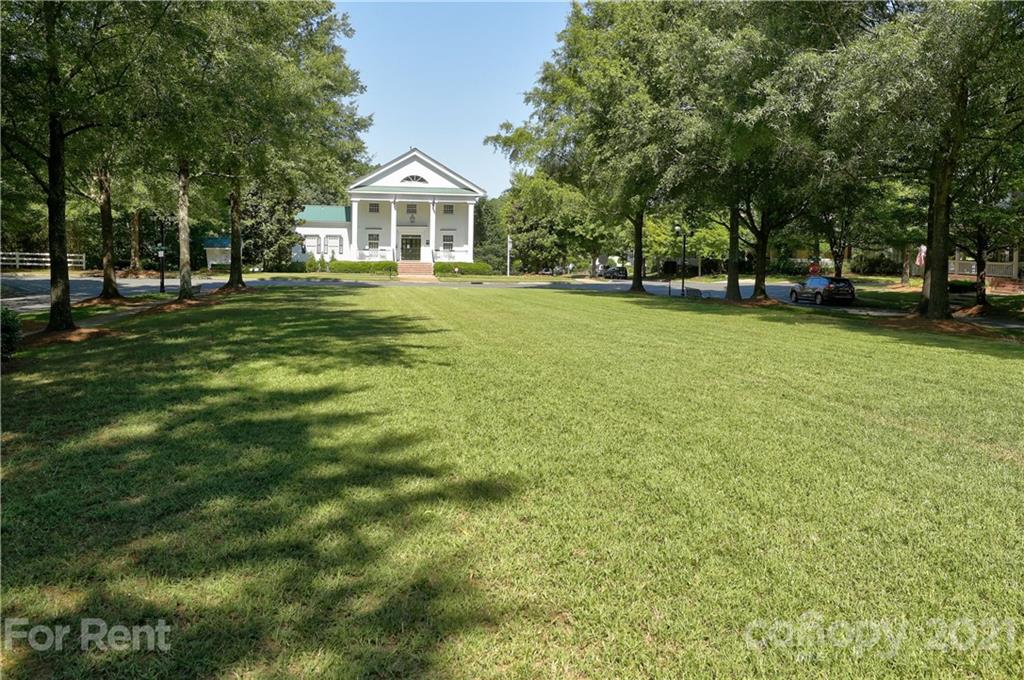 1033 Market Street Fort Mill, SC 29708 - Photo 41 of 46 a front view of a house with a yard