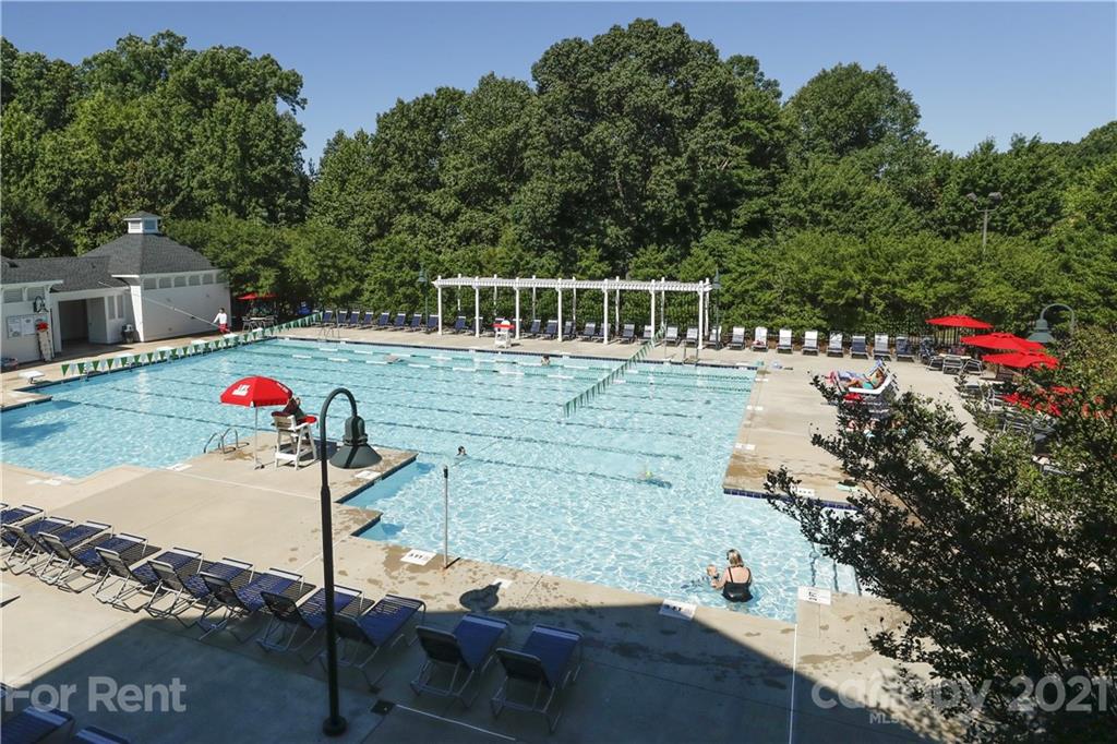 1033 Market Street Fort Mill, SC 29708 - Photo 42 of 46 a view of a wooden deck and living area