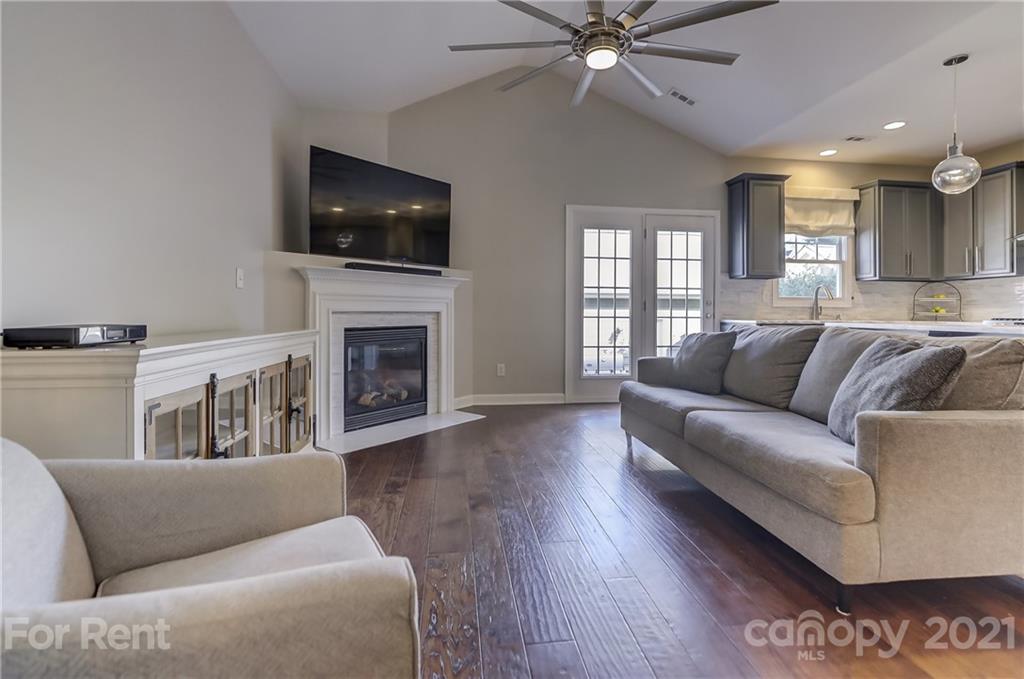 1033 Market Street Fort Mill, SC 29708 - Photo 8 of 46 a living room with furniture and a flat screen tv