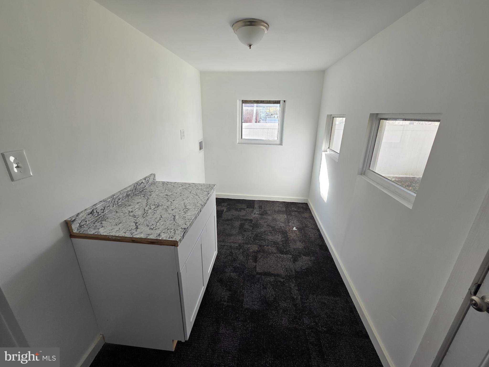 6736 Vandike Street Philadelphia, PA 19135 - Photo 13 of 18 a view of a hallway in a house