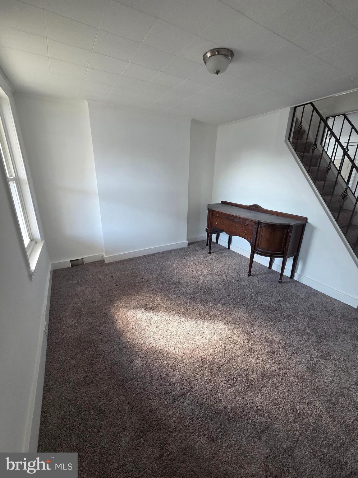 6736 Vandike Street Philadelphia, PA 19135 - Photo 6 of 18 a view of a livingroom with couch