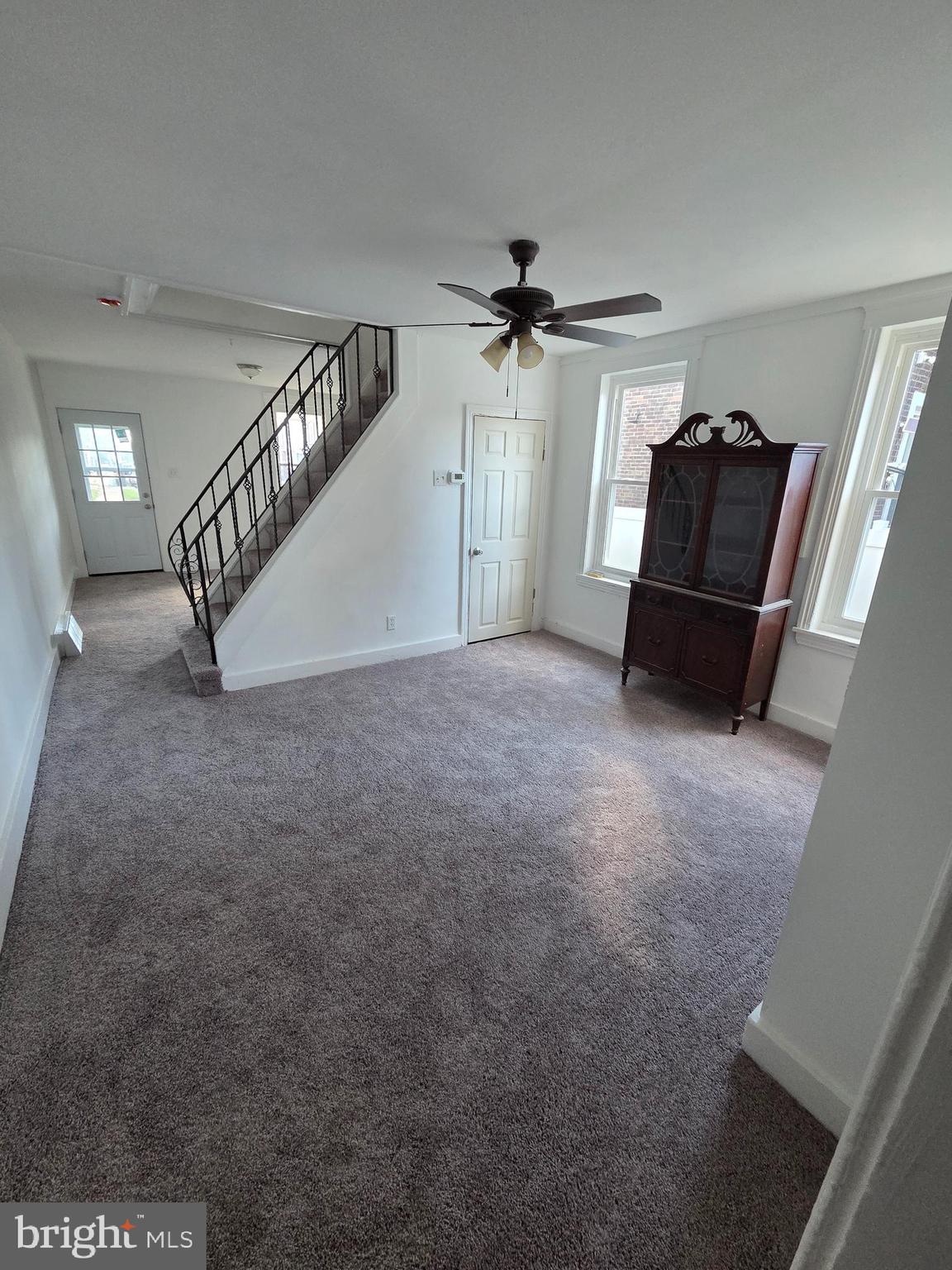 6736 Vandike Street Philadelphia, PA 19135 - Photo 7 of 18 a view of an empty room with wooden floor