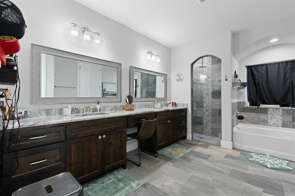 6033 Berry Ridge Lane Joshua, TX 76058 - Photo 20 of 39 a spacious bathroom with a tub sink and mirror