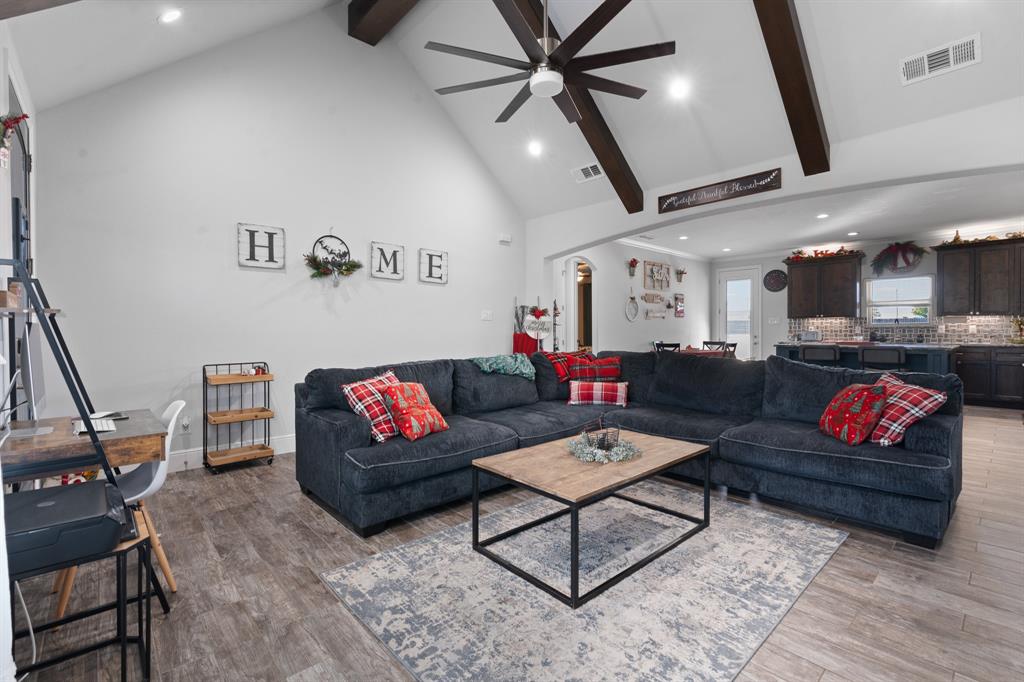 6033 Berry Ridge Lane Joshua, TX 76058 - Photo 3 of 39 a living room with furniture and a wooden floor