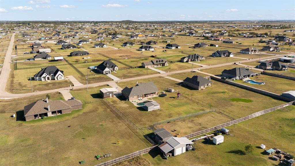 6033 Berry Ridge Lane Joshua, TX 76058 - Photo 38 of 39 an aerial view of residential houses with outdoor space