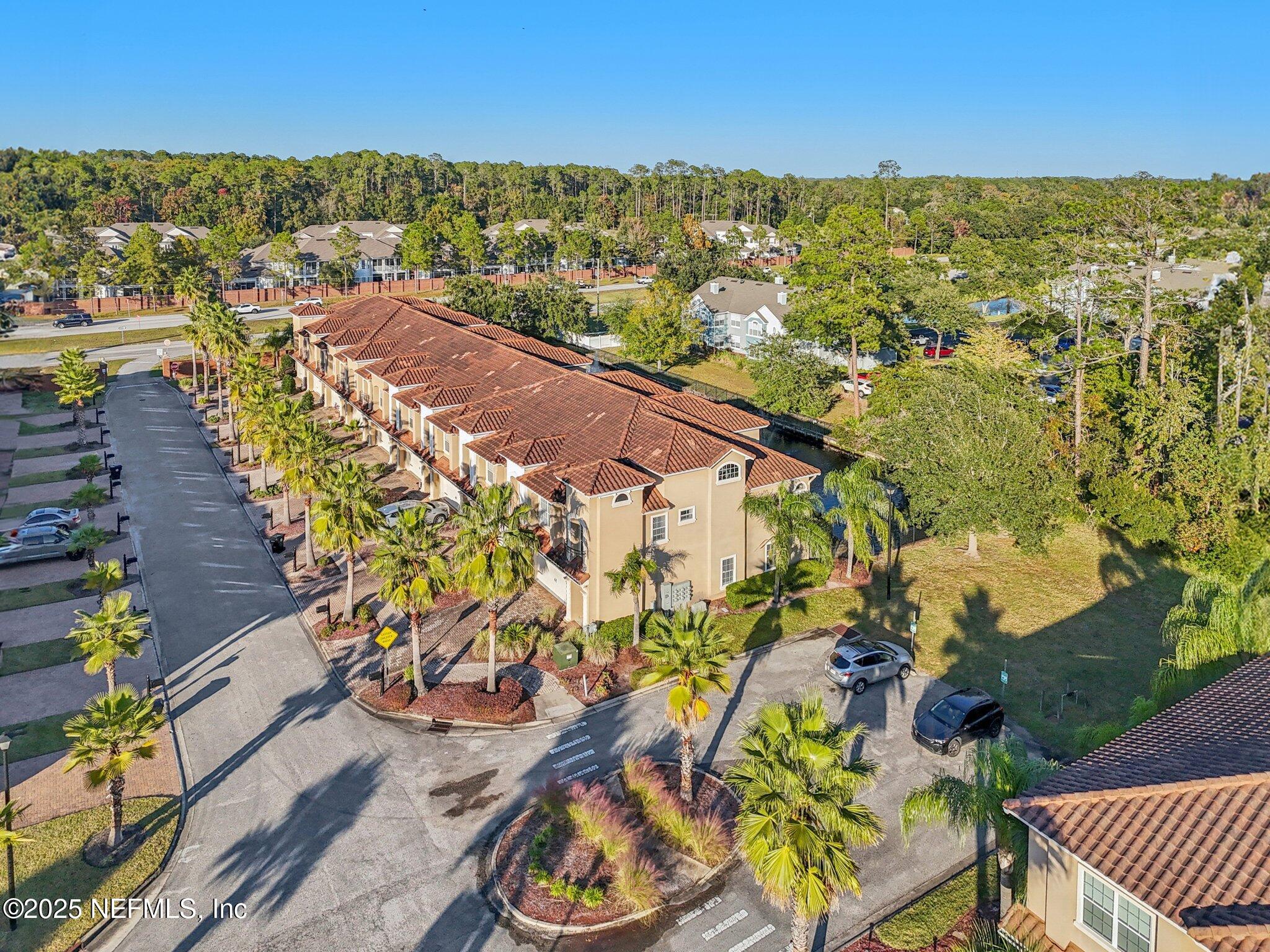 1693 Sanctuary Way Fleming Island, FL 32003 - Photo 29 of 33 an aerial view of residential houses with outdoor space