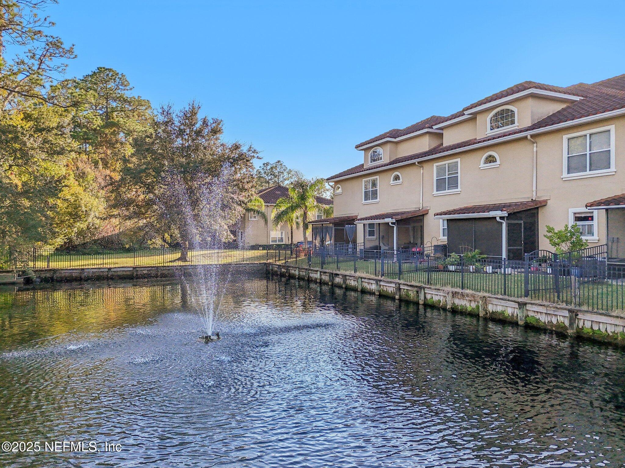 1693 Sanctuary Way Fleming Island, FL 32003 - Photo 30 of 33 a view of a house with lake view