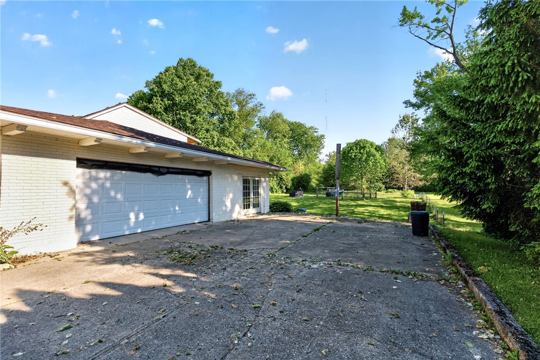 2684 Arthur Road Springfield, OH 45502 - Photo 44 of 69 This residence features a spacious attached garage with ample outdoor space.