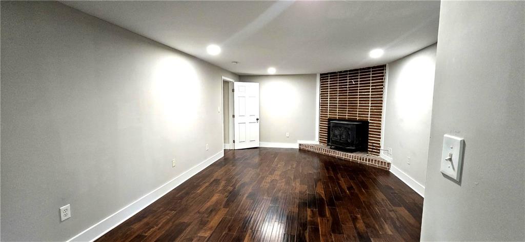 3594 Abbotts Bridge Road Duluth, GA 30096 - Photo 15 of 30 a view of a room with wooden floor and windows
