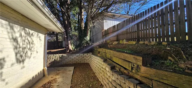 a view of balcony and yard