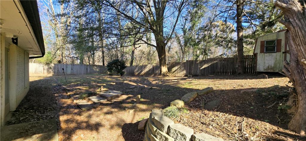 3594 Abbotts Bridge Road Duluth, GA 30096 - Photo 25 of 30 a view of yard with tree