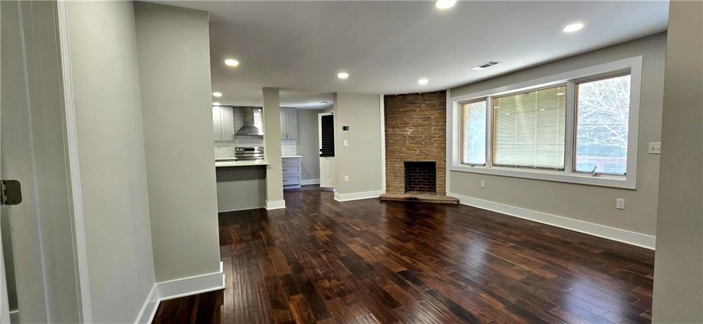 3594 Abbotts Bridge Road Duluth, GA 30096 - Photo 9 of 30 an empty room with wooden floor and windows