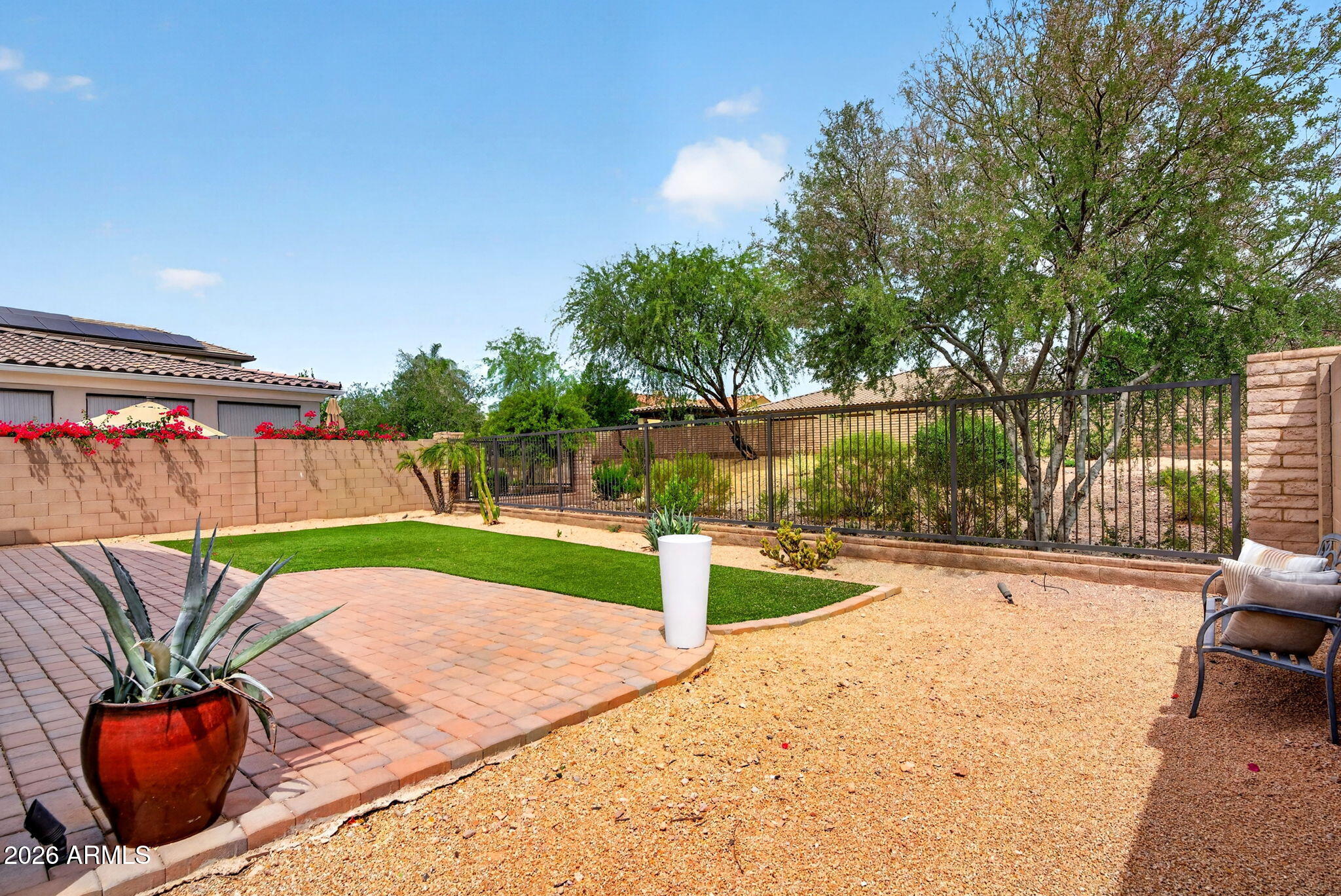 12124 West Peak View Road Peoria, AZ 85383 - Photo 35 of 38 a view of a backyard