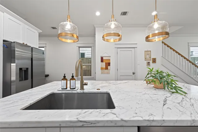 a view of a balcony with wooden floor and fence