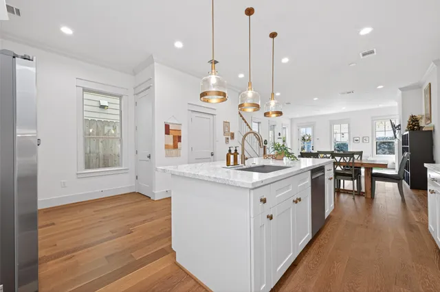a bathroom with a double vanity sink mirror and with
