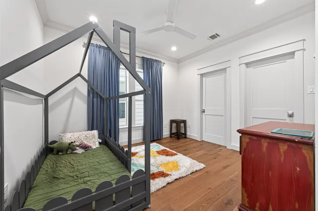 a picture of a building with a yard