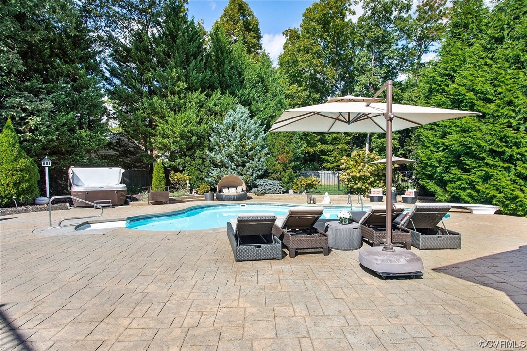 14440 Helmsley Road Midlothian, VA 23113 - Photo 40 of 50 a view of backyard with seating space and trees