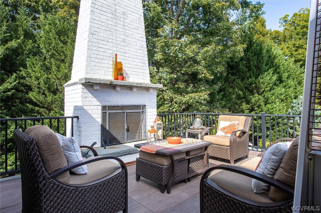 14440 Helmsley Road Midlothian, VA 23113 - Photo 45 of 50 a outdoor living space with patio furniture and a fireplace