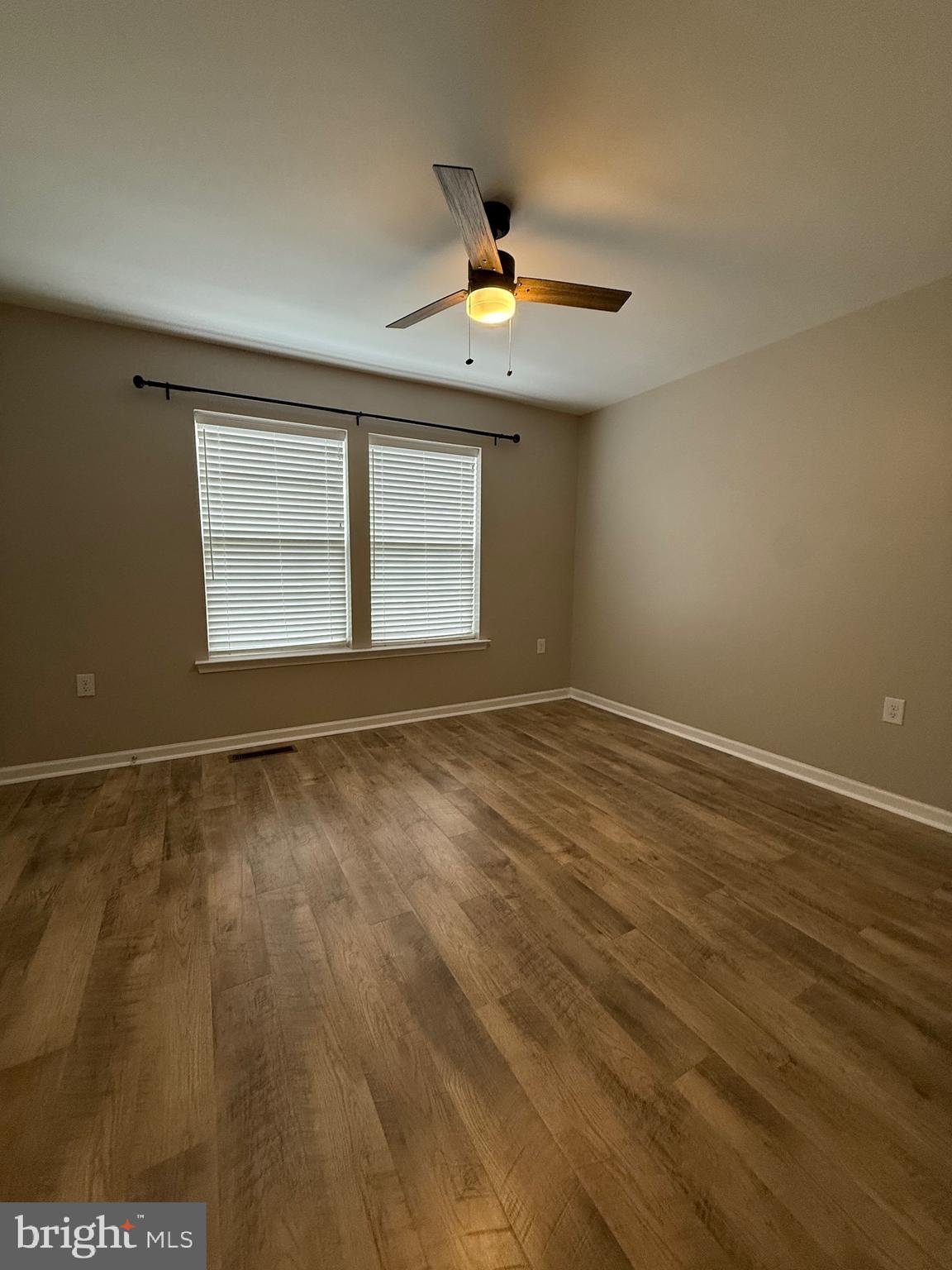 23 Landis Court Falling Waters, WV 25419 - Photo 23 of 45 an empty room with a window and ceiling fan