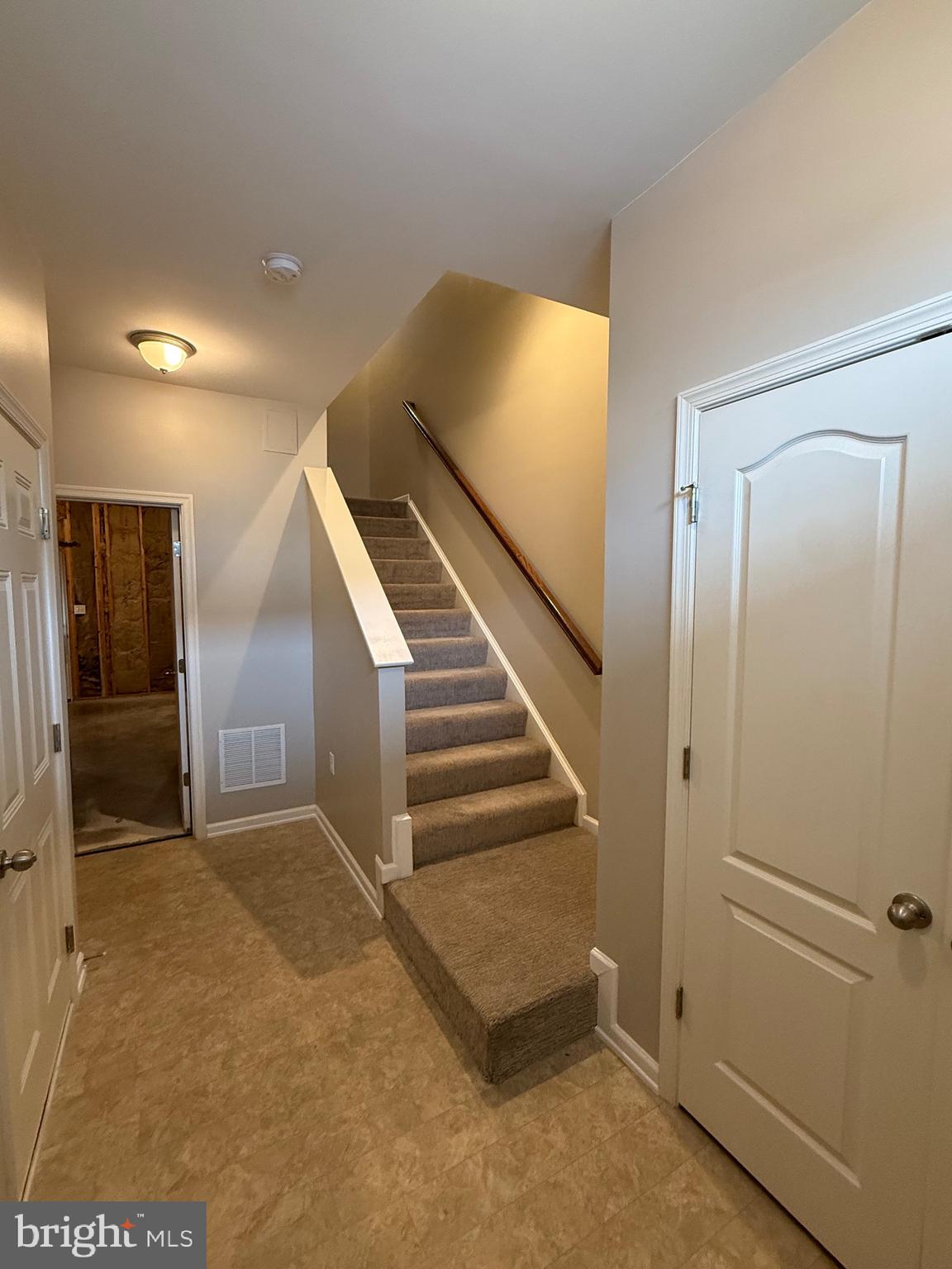 23 Landis Court Falling Waters, WV 25419 - Photo 5 of 45 a view of a hallway with entryway and stairs
