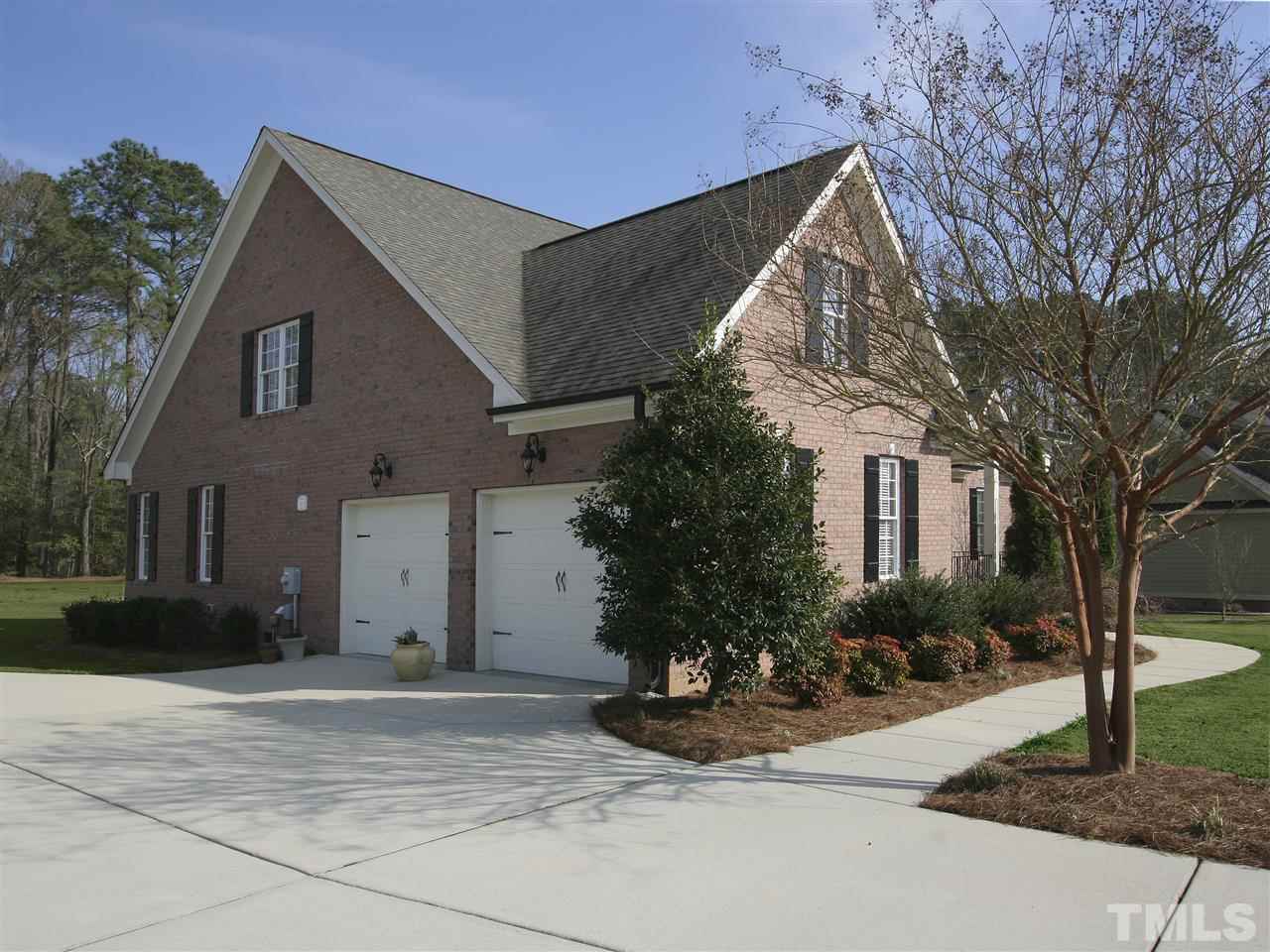 Side-entry garage and lots of driveway parking. Mature landscaping with irrigation system installed.