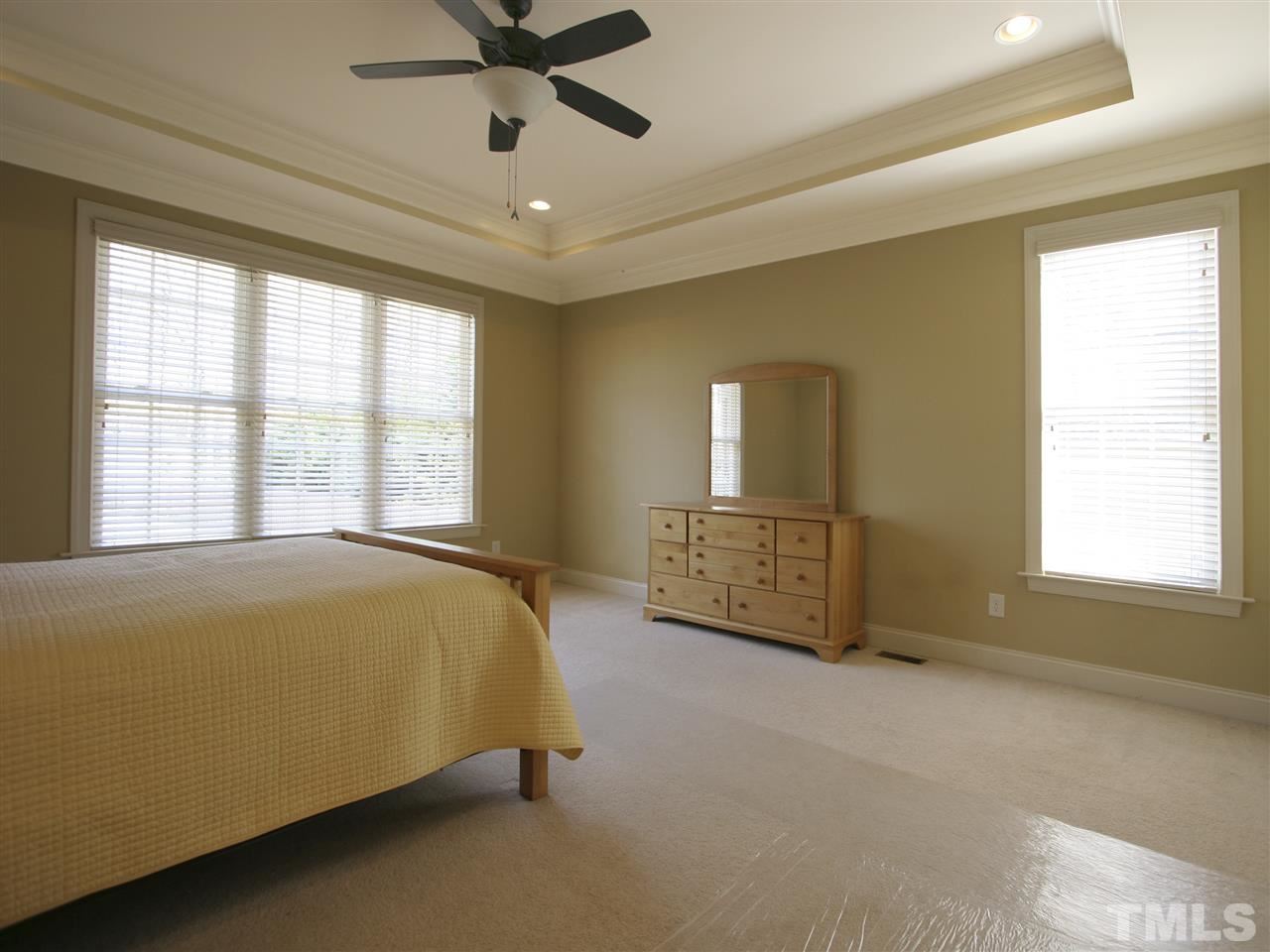 1205 Verde Farm Road Raleigh, NC 27603 - Photo 18 of 25 Master bedroom has plenty of room for your large furniture pieces. Trey ceiling with fan. Plush carpet.