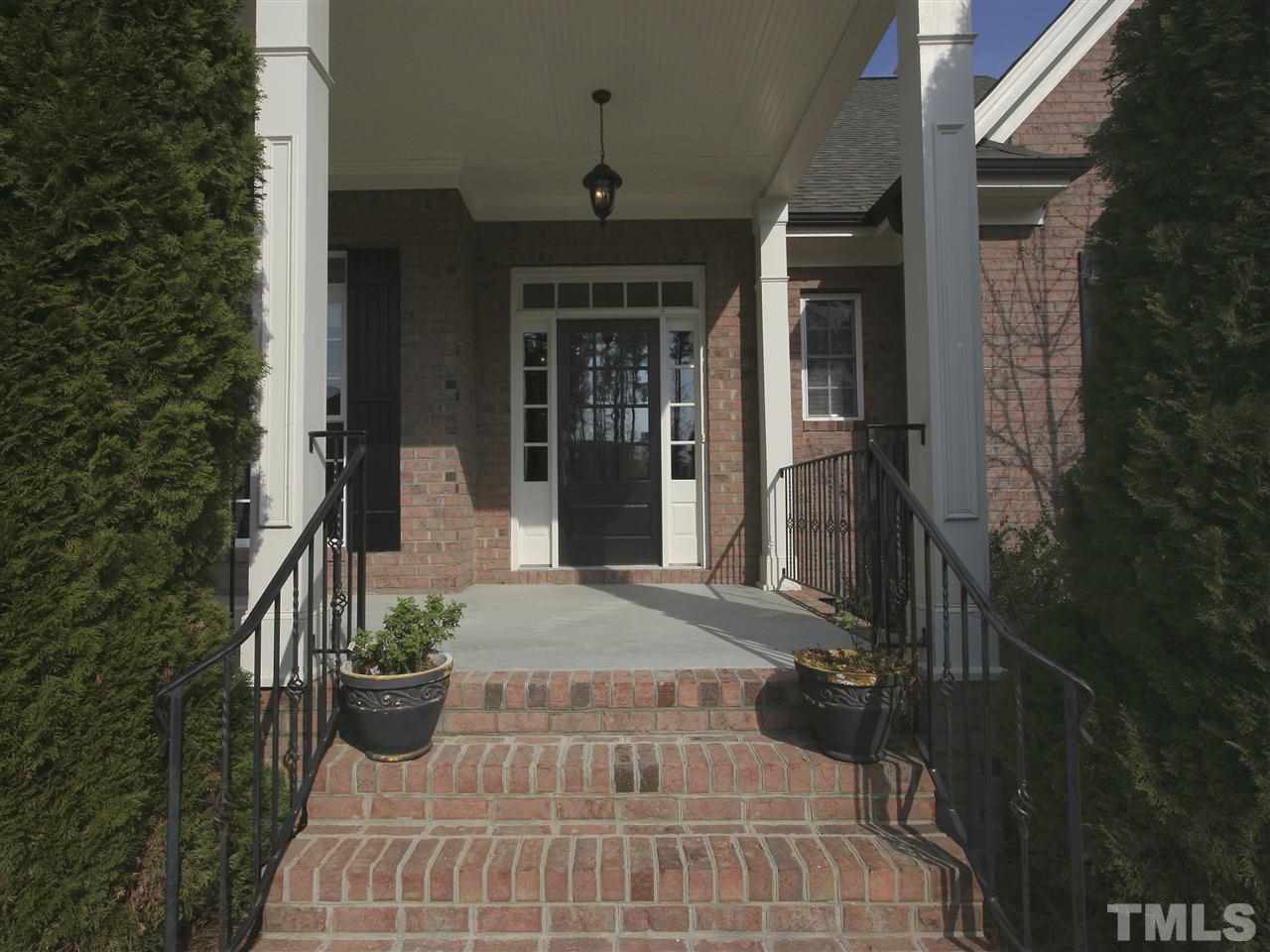 Classic good looks. Covered front porch greets you and your guests.