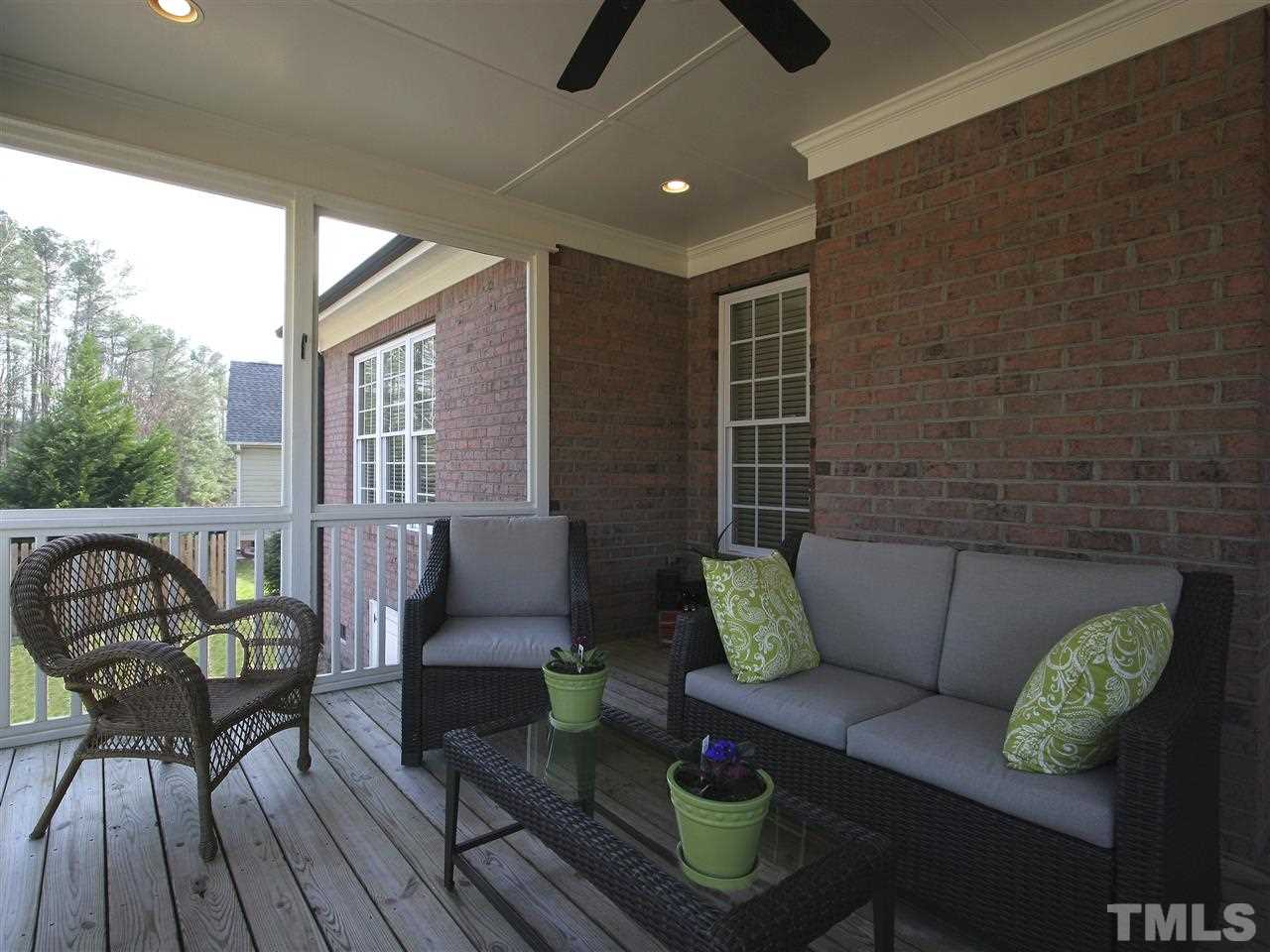 1205 Verde Farm Road Raleigh, NC 27603 - Photo 23 of 25 Relax on the three-season screened porch. Recessed lighting. Ceiling fan.