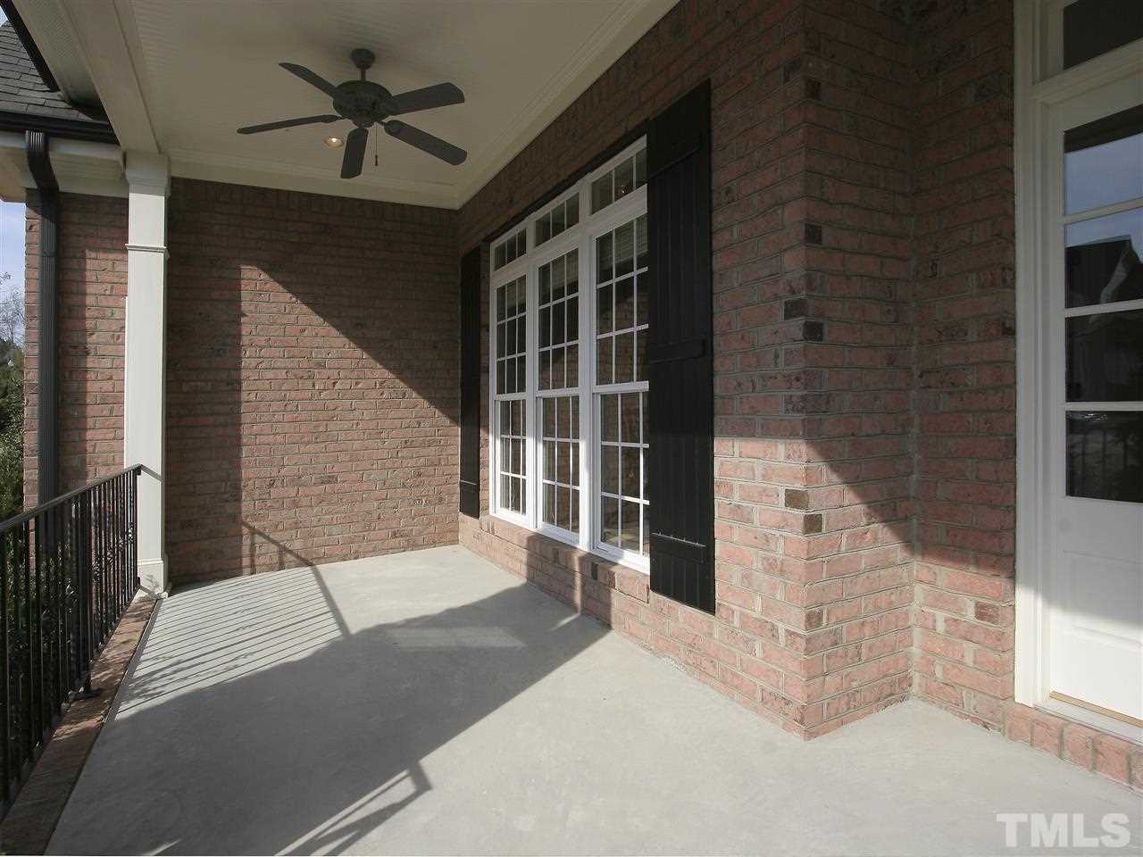 Rocking-chair-style front porch is a great space to sit and enjoy the temperate North Carolina weather.
