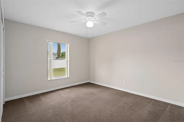 an aerial view of residential building and lake