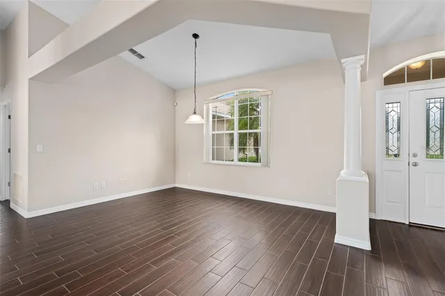 a kitchen with stainless steel appliances a sink stove and cabinets