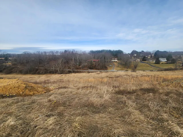 a view of mountain with lake view