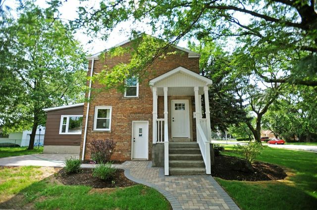 2633 West 99th Street Chicago, IL 60655 - Photo 1 of 17 front view of a house with a yard