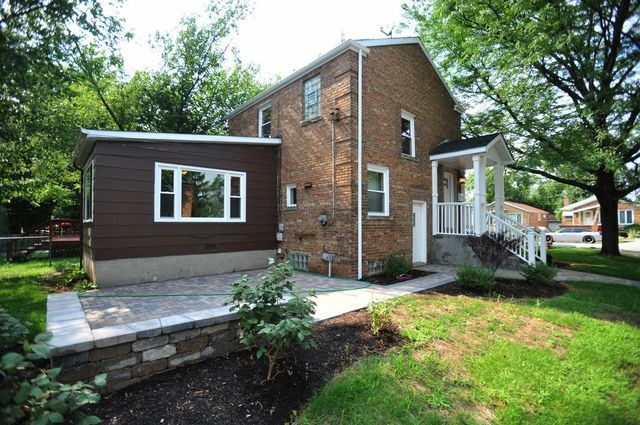 2633 West 99th Street Chicago, IL 60655 - Photo 17 of 17 a view of a house with a yard and plants