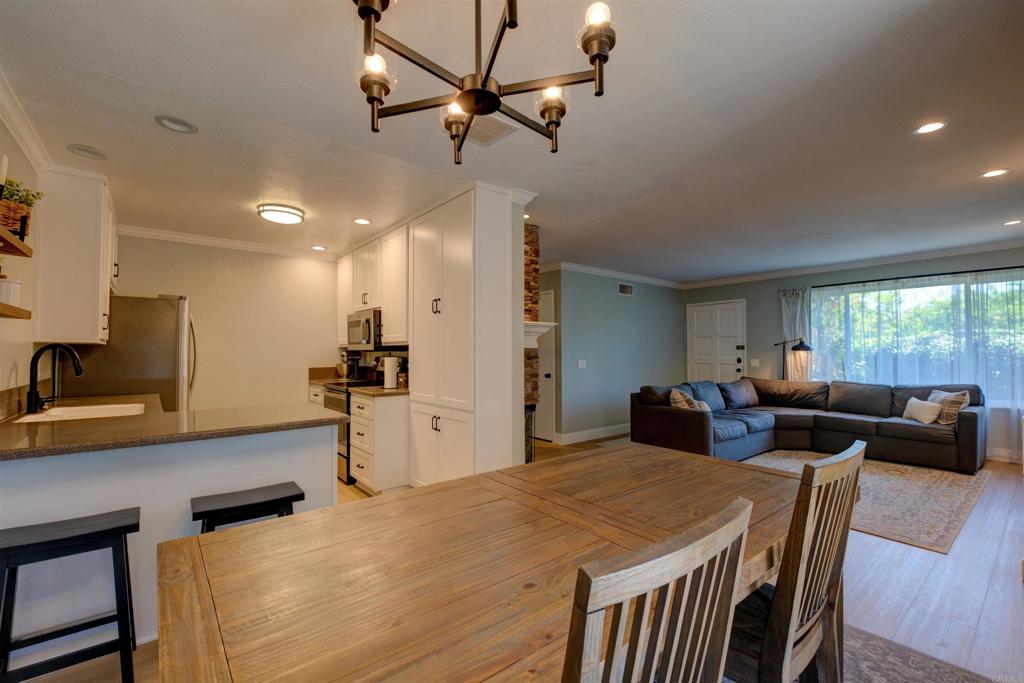 8942 Fletcher Valley Dr. Santee, CA 92071 - Photo 12 of 32 a view of a dining room with furniture