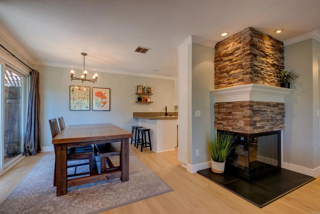 8942 Fletcher Valley Dr. Santee, CA 92071 - Photo 13 of 32 a room with furniture and a chandelier