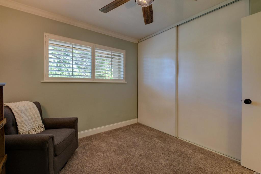 8942 Fletcher Valley Dr. Santee, CA 92071 - Photo 15 of 32 a living room with furniture and a window
