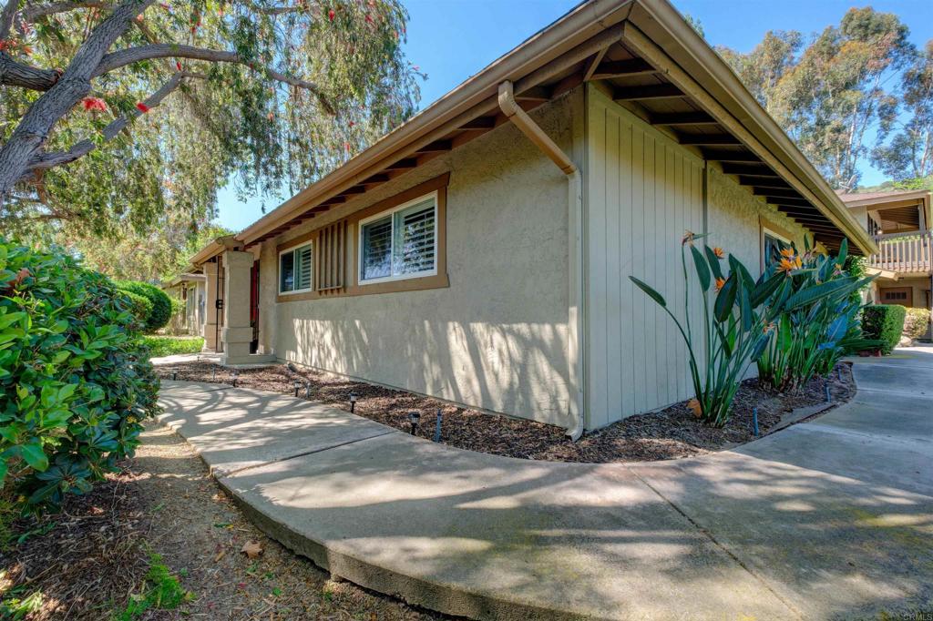 8942 Fletcher Valley Dr. Santee, CA 92071 - Photo 2 of 32 a view of a house with backyard