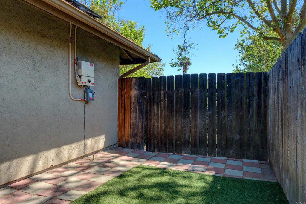8942 Fletcher Valley Dr. Santee, CA 92071 - Photo 25 of 32 a backyard of a house