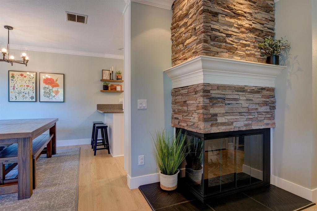 8942 Fletcher Valley Dr. Santee, CA 92071 - Photo 5 of 32 a room with furniture and a potted plant