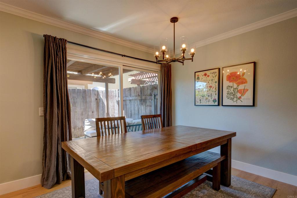 8942 Fletcher Valley Dr. Santee, CA 92071 - Photo 6 of 32 a view of a dining room with furniture window and outside view