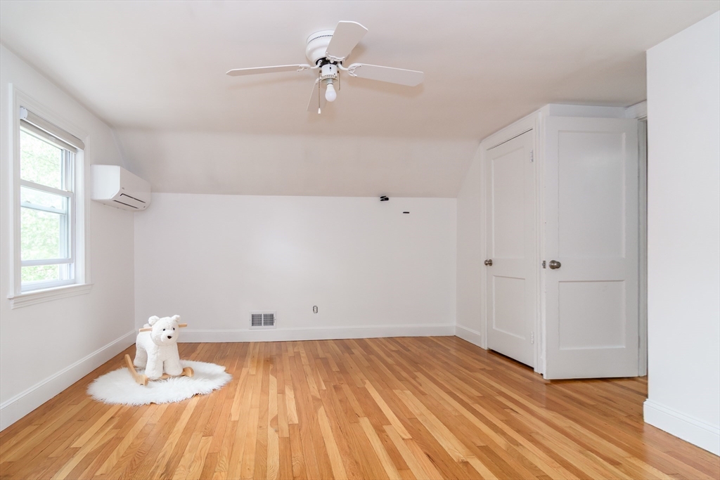 7 Ferndale Road Natick, MA 01760 - Photo 15 of 20 wooden floor in an empty room with a window