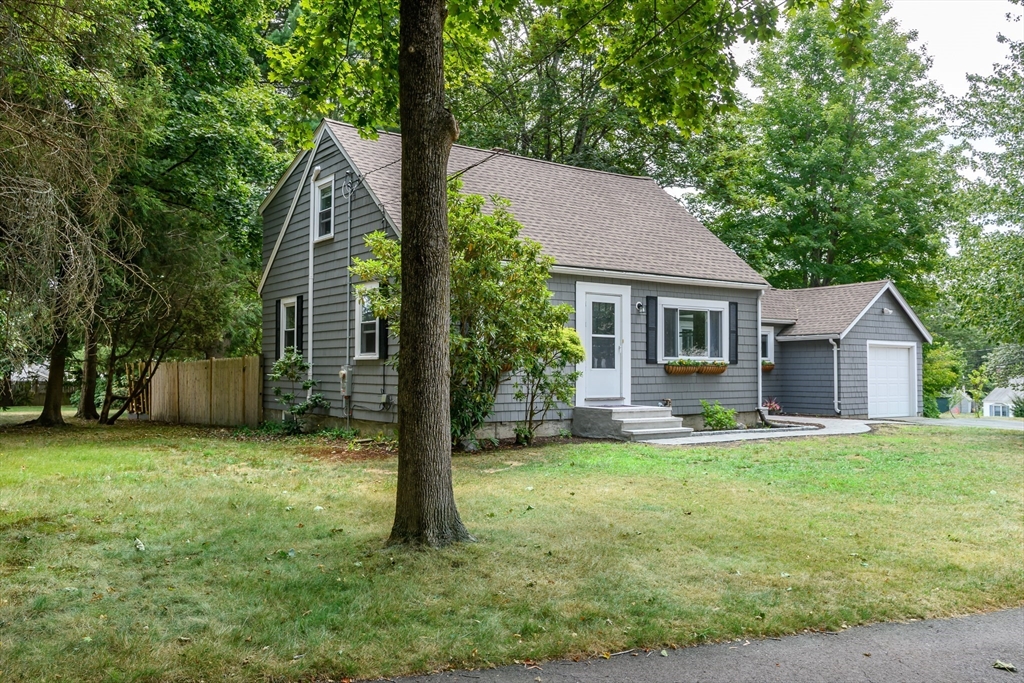 7 Ferndale Road Natick, MA 01760 - Photo 2 of 20 a backyard of a house with seating space