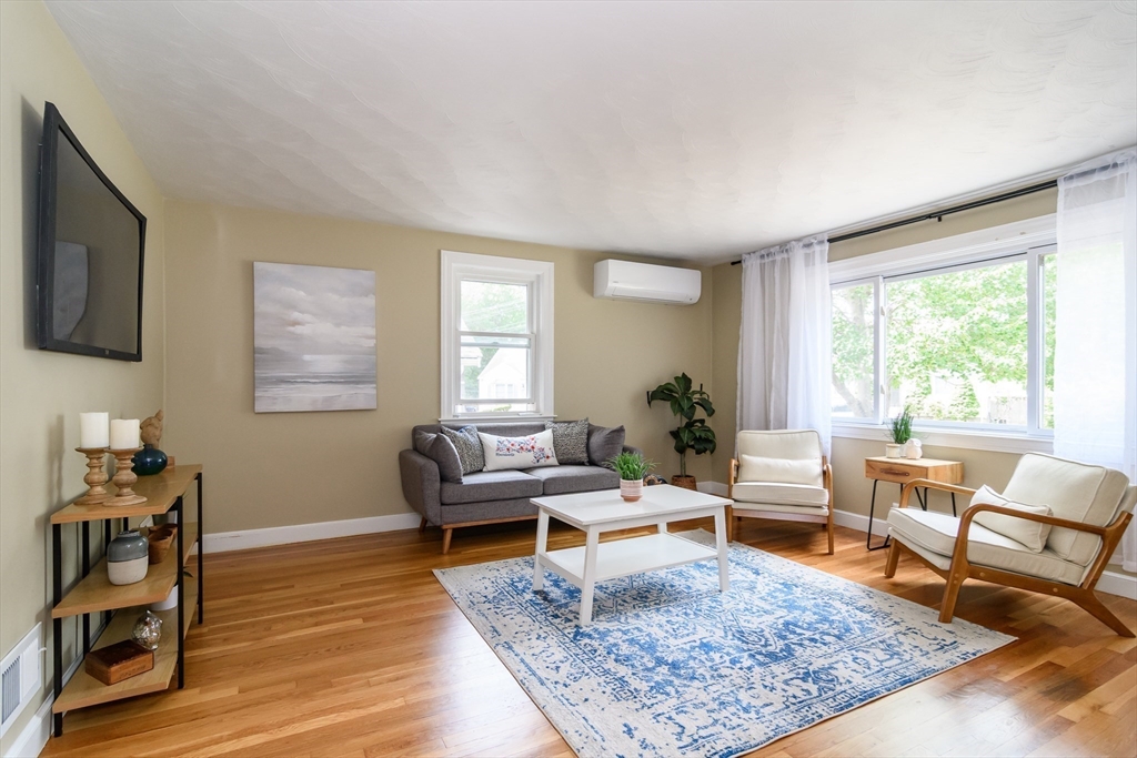 7 Ferndale Road Natick, MA 01760 - Photo 3 of 20 a living room with furniture and a rug