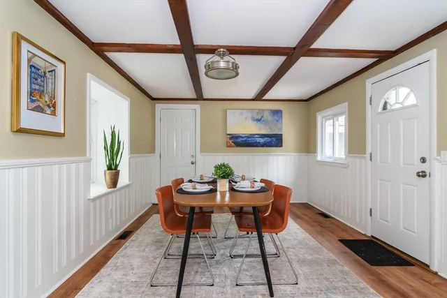 a view of a dining room with furniture