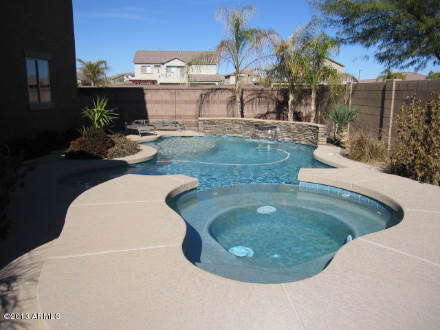 6201 South Rochester Drive Gilbert, AZ 85298 - Photo 9 of 29 WATER FALL IN POOL