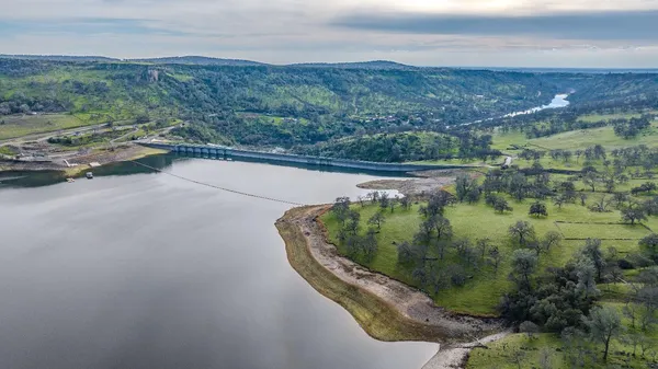 a view of a lake in middle of the town