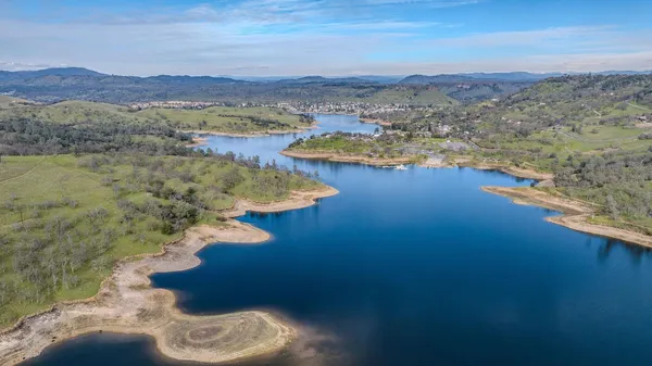 a view of lake with mountain