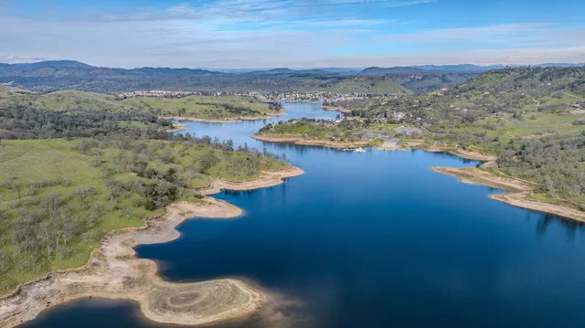 a view of lake with mountain