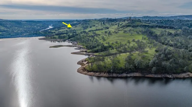 a view of a lake with a mountain